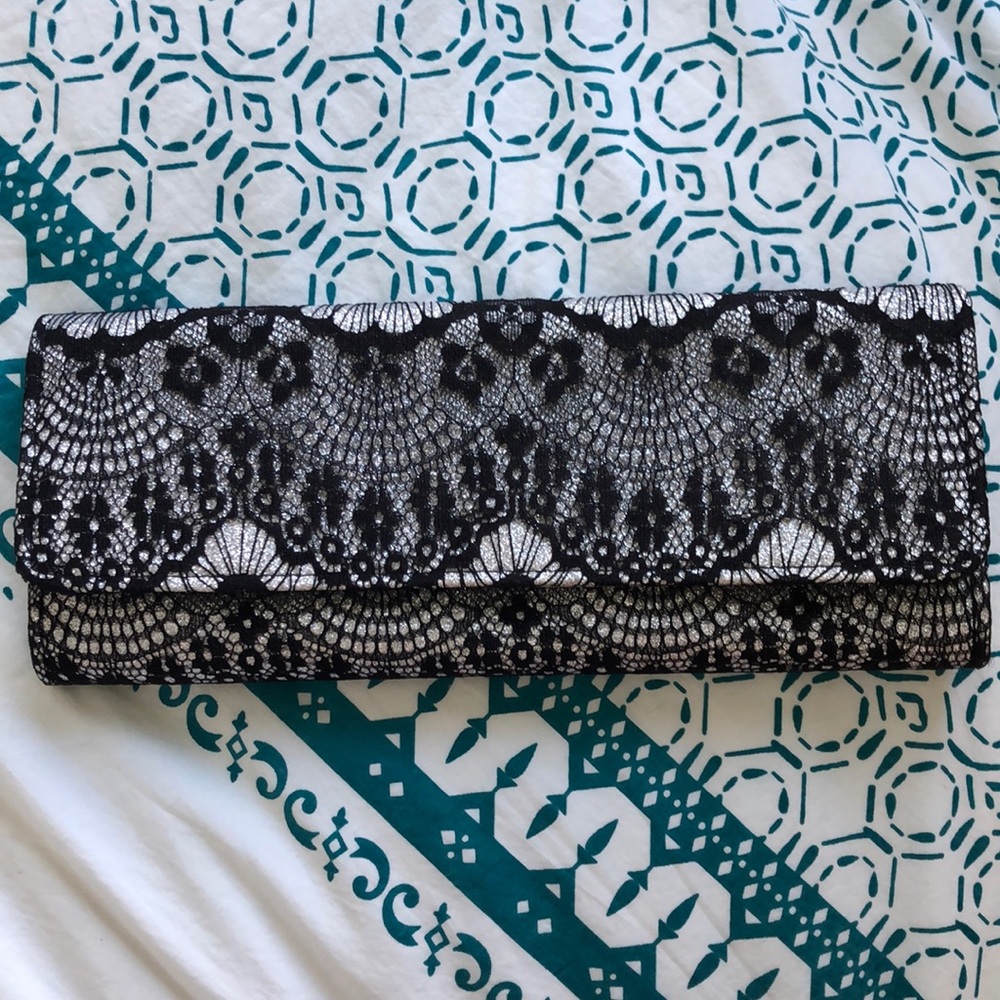 Sliver and black clutch